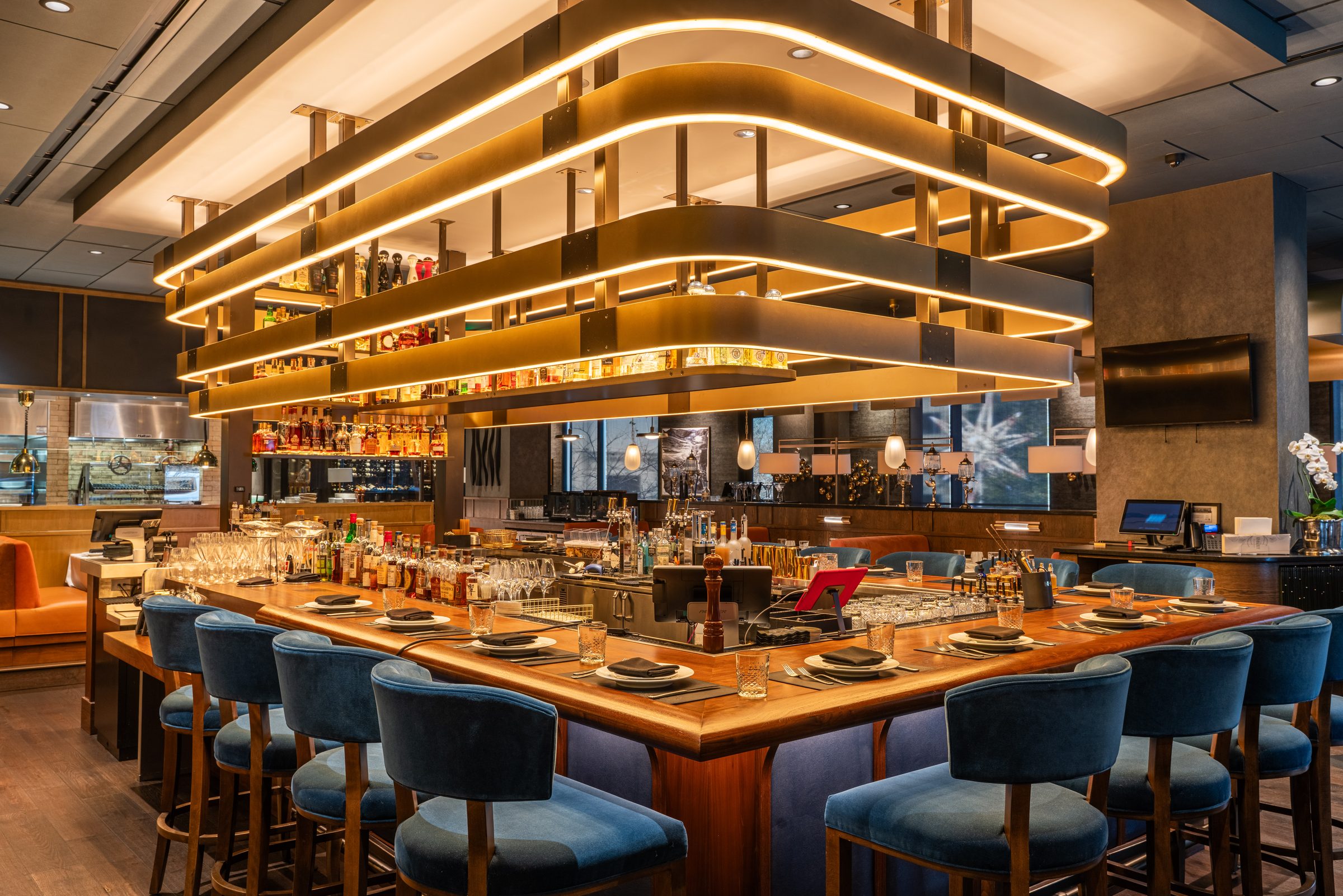 Bar and overhead shelving at The Kimberly restaurant in Austin, built by SunRay Contracting